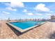 Beautiful rooftop pool with lounging chairs and umbrellas at 3047 S Atlantic Ave # 1805, Daytona Beach, FL 32118