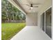Covered outdoor patio with ceiling fan, recessed lighting, and view of the backyard at 349 Baker Ave, Lake Helen, FL 32744