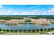 Elevated view of a luxury apartment community with water features and pristine landscaping promoting a vibrant lifestyle at 3592 Grande Tuscany Way, New Smyrna Beach, FL 32168