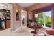 This bedroom is equipped with a spacious closet, a large window, and stylish decor at 3592 Grande Tuscany Way, New Smyrna Beach, FL 32168
