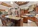 Well-designed kitchen featuring custom cabinetry, granite countertops, and modern appliances at 3592 Grande Tuscany Way, New Smyrna Beach, FL 32168