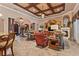 Open-concept living area showcasing tile floors, arched entryways, and stylish furnishings, perfect for modern living at 3592 Grande Tuscany Way, New Smyrna Beach, FL 32168