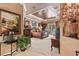 Luxurious main bedroom with tray ceiling, plush carpet, and private patio entrance at 3592 Grande Tuscany Way, New Smyrna Beach, FL 32168