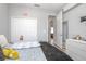 Comfortable bedroom featuring a double closet, and access to the hallway at 413 Last Tree Dr, Deland, FL 32720