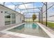 Inviting pool with screened enclosure, seamlessly blending indoor and outdoor living at 413 Last Tree Dr, Deland, FL 32720