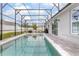 Beautiful pool with screened enclosure, providing a private and relaxing outdoor space at 413 Last Tree Dr, Deland, FL 32720