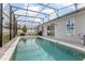 Sparkling pool with screened enclosure and spacious patio area, perfect for entertaining at 413 Last Tree Dr, Deland, FL 32720