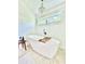 Bright bathroom featuring a soaking tub, chandelier, and shiplap walls at 417 S Palmetto Ave, Daytona Beach, FL 32114