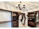 Spacious walk-in closet with custom wood shelving and ample storage at 417 S Palmetto Ave, Daytona Beach, FL 32114