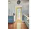 Open kitchen with an exterior door and custom cabinetry at 417 S Palmetto Ave, Daytona Beach, FL 32114