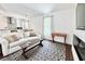 Open-concept living area with modern decor and plenty of natural light at 417 S Palmetto Ave, Daytona Beach, FL 32114