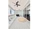 Covered porch features a ceiling fan and sliding glass doors to the interior at 417 S Palmetto Ave, Daytona Beach, FL 32114