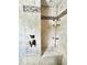 Elegant shower with neutral tile and mosaic accents at 417 S Palmetto Ave, Daytona Beach, FL 32114
