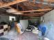Spacious attic area reveals exposed roof framing, storage space, and natural light at 43721 State Road 19, Altoona, FL 32702
