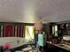 Cozy kitchen features a retro mini fridge and unique lighting fixture, adding a vintage charm at 43721 State Road 19, Altoona, FL 32702