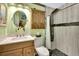 Updated bathroom with walk-in shower and modern vanity at 535 Black Ironwood Dr, Deland, FL 32724