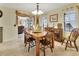 Dining room with chandelier, decor, and view to living room at 535 Black Ironwood Dr, Deland, FL 32724