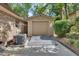 Detached garage with wooden ramp and siding that complements the exterior of the main house at 535 Black Ironwood Dr, Deland, FL 32724