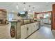 Spacious kitchen with a large island, stainless appliances, and an open view of the living area at 535 Black Ironwood Dr, Deland, FL 32724