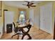 Office space with wood floors and a ceiling fan at 535 Black Ironwood Dr, Deland, FL 32724