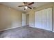 A bright bedroom features a closet and entry into a hallway at 6 Laurel Pass Ct, Ocala, FL 34480