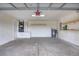 A two car garage with shelves and an HVAC system at 6 Laurel Pass Ct, Ocala, FL 34480