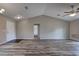 Open-concept living room with vaulted ceiling and wood-look flooring at 6 Laurel Pass Ct, Ocala, FL 34480