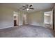 Spacious main bedroom with carpet flooring and ensuite bathroom at 6 Laurel Pass Ct, Ocala, FL 34480