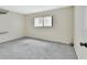 Neutral bedroom featuring light gray carpet, and a window at 600 N Boundary Ave # 110A, Deland, FL 32720