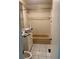 Cozy bathroom featuring a tiled shower, a vanity, and neutral tones for a functional and tidy space at 621 W Indiana Ave # 13, Deland, FL 32720