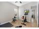 A bonus room that features access to an ensuite office and includes an exercise area at 6871 Forkmead Ln, Port Orange, FL 32128