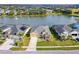 Beautiful single Gathering home with well manicured lawn and landscaping in a lakeside community at 6871 Forkmead Ln, Port Orange, FL 32128