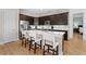 Spacious kitchen with a large island, stainless steel appliances, and a breakfast bar at 6871 Forkmead Ln, Port Orange, FL 32128
