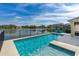 Sparkling in-ground pool with relaxing lake views at 6871 Forkmead Ln, Port Orange, FL 32128