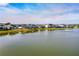 A beautiful lake view from the rear of the house and backyard at 6871 Forkmead Ln, Port Orange, FL 32128