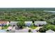 Overhead view of townhouses in lush, serene setting offering residents a blend of nature, convenience, and community living at 721 Laurel Bay Cir, New Smyrna Beach, FL 32169