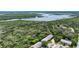 Beautiful aerial view showcases property near lush foliage and a serene inlet, perfect for nature lovers and outdoor enthusiasts at 721 Laurel Bay Cir, New Smyrna Beach, FL 32169