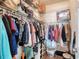 Functional walk-in closet with shelves and hanging storage providing efficient organization at 721 Laurel Bay Cir, New Smyrna Beach, FL 32169