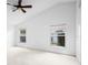 Spacious bedroom with neutral carpet, ceiling fan, and bright windows at 802 Royal Oak Ct, Deland, FL 32724