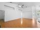 Spacious living room with laminate flooring, high ceilings, and ample natural light, perfect for entertaining at 802 Royal Oak Ct, Deland, FL 32724
