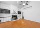 Bright living room features a fireplace with marble surround and built-in shelving at 802 Royal Oak Ct, Deland, FL 32724