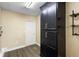 Large storage room with shelving and dark wood flooring at 802 Royal Oak Ct, Deland, FL 32724