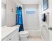 Well-lit bathroom features a tub-shower combo and a modern vanity at 833 Lucerne Cir, Ormond Beach, FL 32174