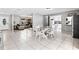 Spacious open floor plan showing the Dining Room, kitchen, and adjacent Living Room at 833 Lucerne Cir, Ormond Beach, FL 32174