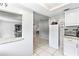 Open concept kitchen with light and bright finishes and plenty of storage at 833 Lucerne Cir, Ormond Beach, FL 32174