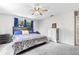 Relaxing main bedroom with neutral colors, soft carpet, and windows for plenty of light at 833 Lucerne Cir, Ormond Beach, FL 32174