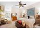 Tranquil main bedroom suite with neutral decor and adjoining bathroom access at 940 Glenwood Rd, Deland, FL 32720