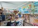 Bright studio with colorful artwork and craft supplies, perfect for creative projects at 940 Glenwood Rd, Deland, FL 32720