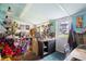 Charming studio filled with art supplies, flowers, and natural light at 940 Glenwood Rd, Deland, FL 32720