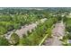 An elevated view of the community surrounded by mature trees and lush landscaping at 944 Regatta Bay Dr # 12-102, Orange City, FL 32763